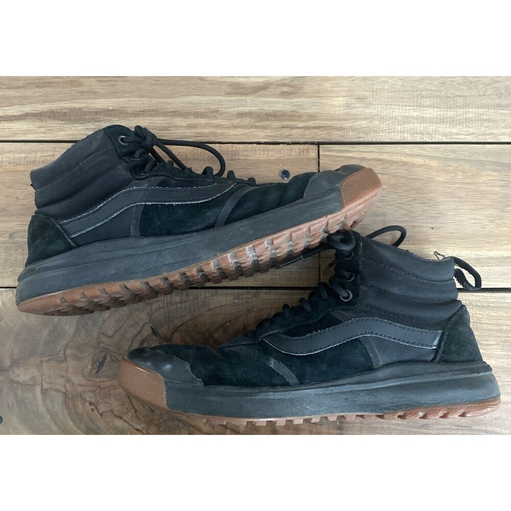 Men’s Size 9.5 Black High top Van’s sneakers